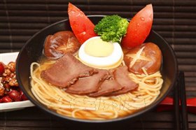 ţ