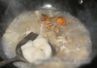 螃蟹煮年糕的做法 步骤7