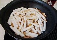 榨菜肉丝炒年糕的做法 步骤11