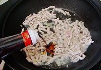榨菜肉丝炒年糕的做法 步骤9